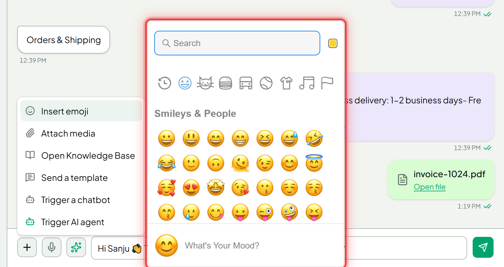 The emoji picker open above the composer